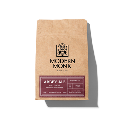 Kraft paper coffee bag with 'Modern Monk Coffee' branding on a white background