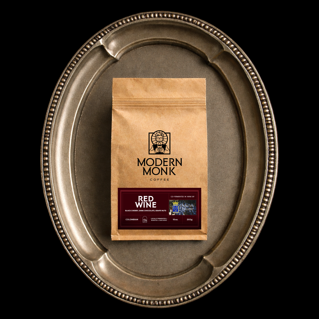 Modern Monk coffee package on a metallic tray with a black background